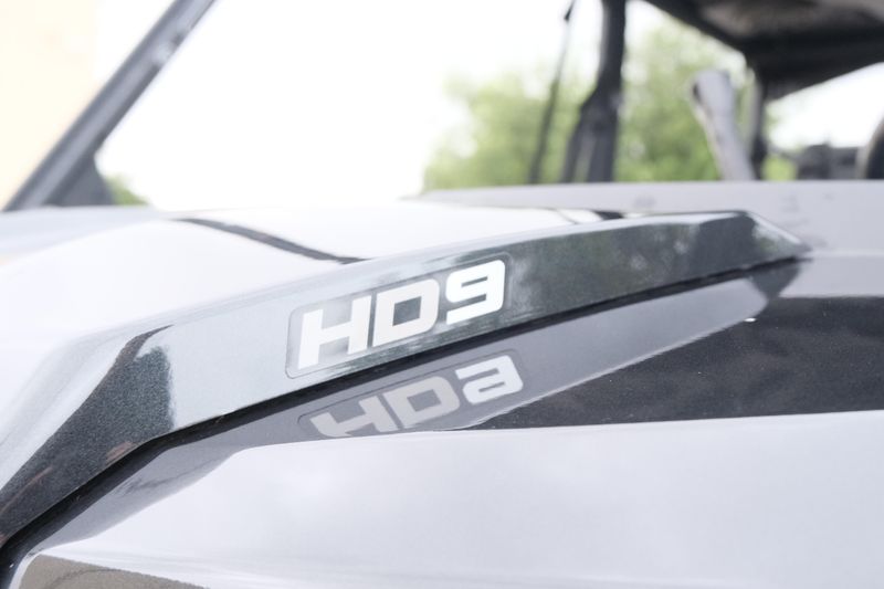NEW 2026 CAN-AM DEFENDER MAX DPS HD9  in a STEALTH BLACK exterior color. Family PowerSports (877) 886-1997 familypowersports.com 