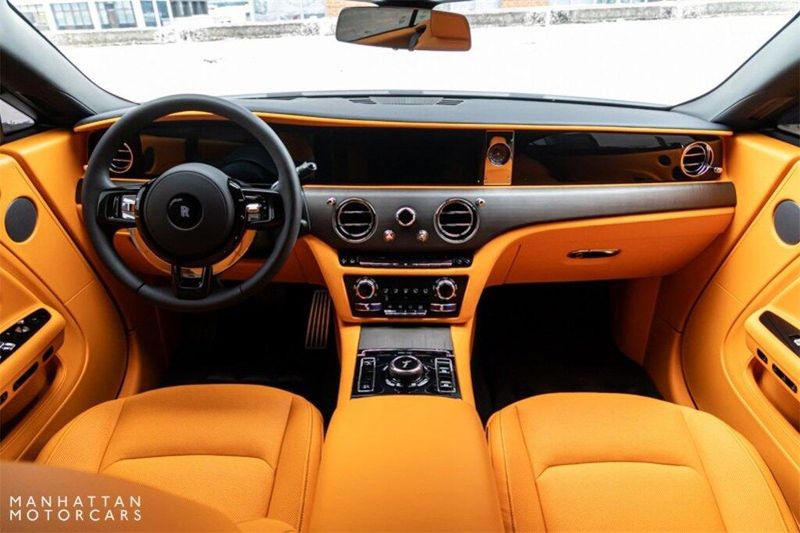 2024 Rolls-Royce Spectre  in a Arctic White exterior color and Mandarininterior. Lotus Manhattan 347-395-5714 lotusmanhattan.com 