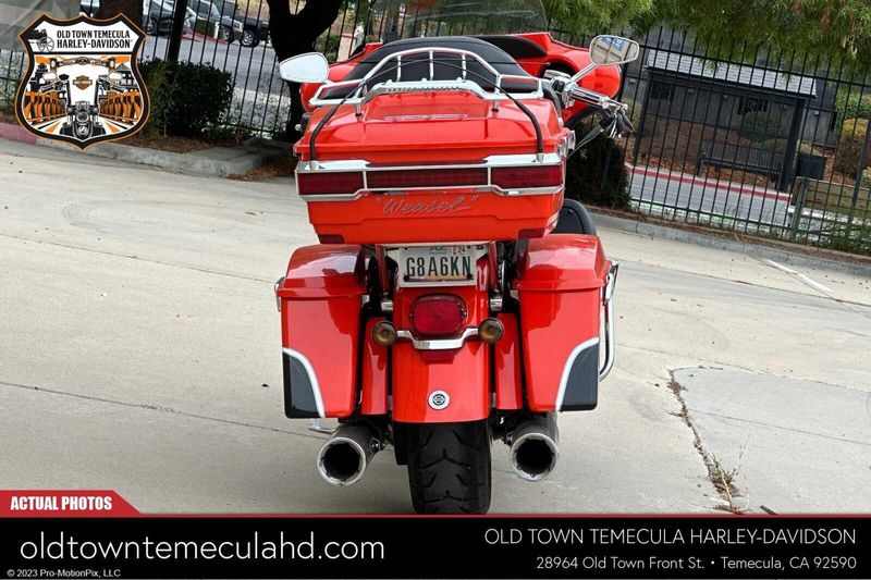 2012 Harley-Davidson Electra Glide in a ELE ORG/BLK DIA W/ PINSTRIP exterior color. BMW Motorcycles of Temecula – Southern California (951) 506-6903 bmwmotorcyclesoftemecula.com 