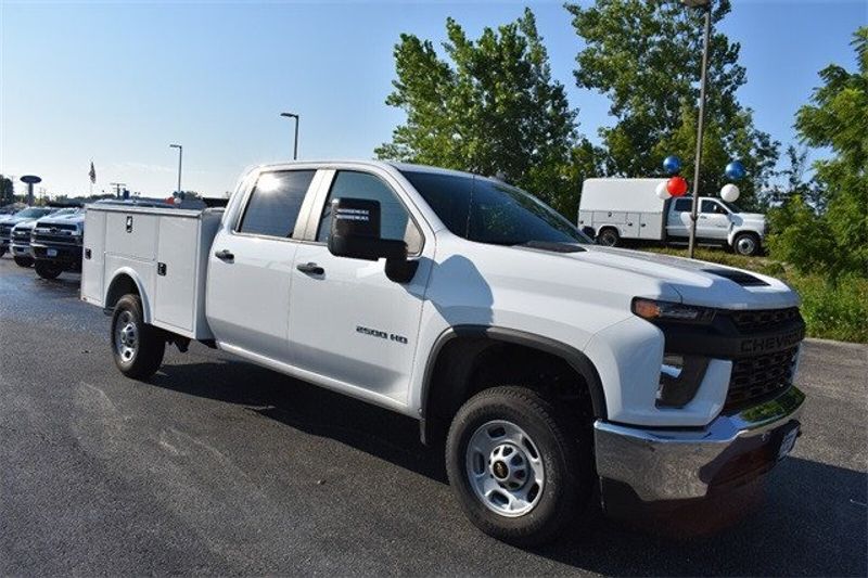 2023 Chevrolet Silverado 2500HD Work Truck in a Summit White exterior color and Blackinterior. Raymond Auto Group 888-703-9950 raymonddeals.com 