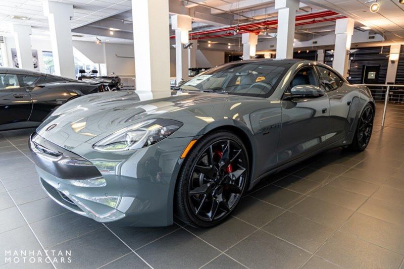 2022 Karma GS-6 Sport in a Pacifico Grey with Blackout Package exterior color and Palisades Grey over Carbon fiberinterior. Lotus Manhattan 347-395-5714 lotusmanhattan.com 