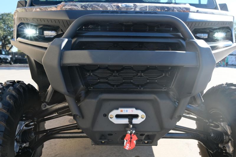 NEW 2026 CAN-AM DEFENDER MAX XT HD11  in a DARK WILDLAND CAMO exterior color. Family PowerSports (877) 886-1997 familypowersports.com 