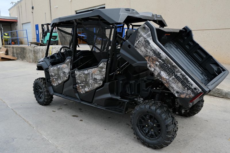 NEW 2025 HONDA PIONEER 10006 DELUXE CREW  in a TRUETIMBER ATERA CAMO exterior color. Family PowerSports (877) 886-1997 familypowersports.com 