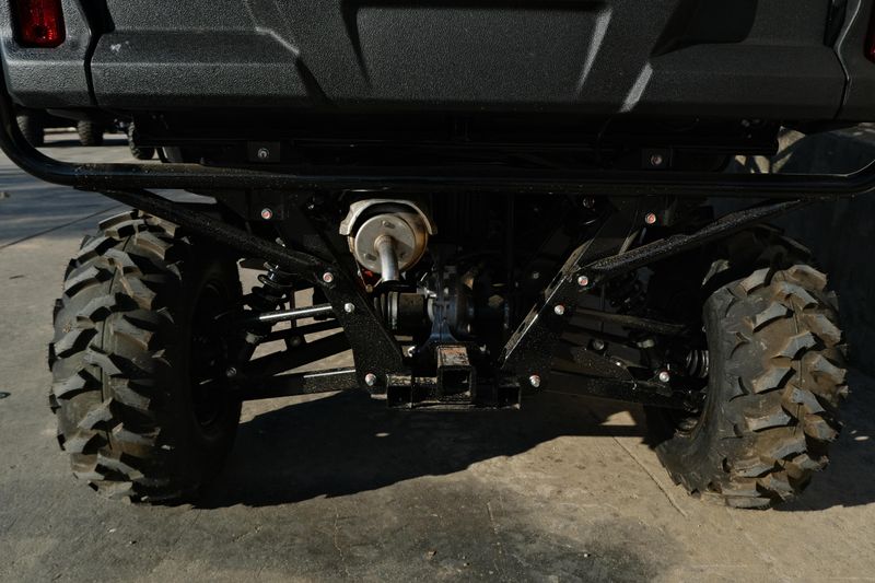 NEW 2026 HONDA PIONEER 7004  in a HERO RED exterior color. Family PowerSports (877) 886-1997 familypowersports.com