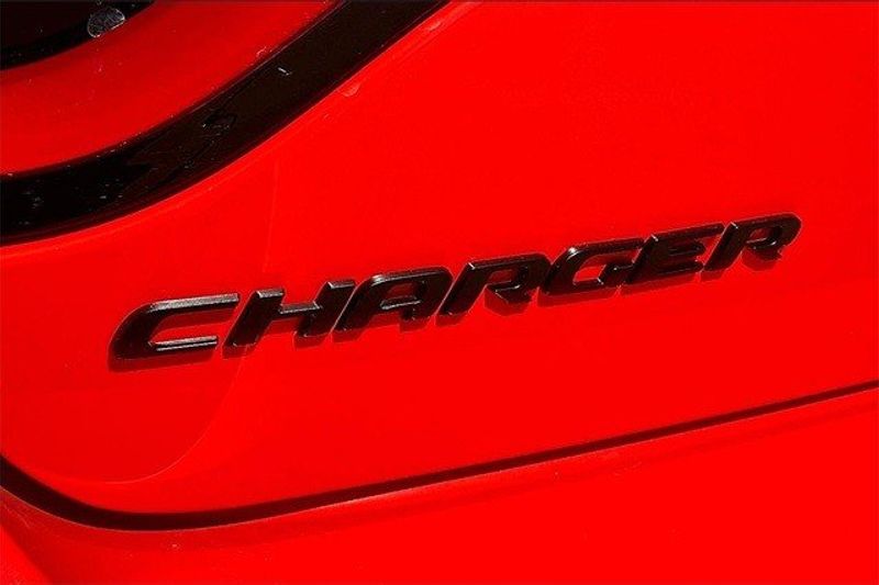 2023 Dodge Charger SXT Rwd in a Go Mango exterior color and Blackinterior. Elder CDJR Cedar Creek 430-558-0679 eldercedarcreek.com 