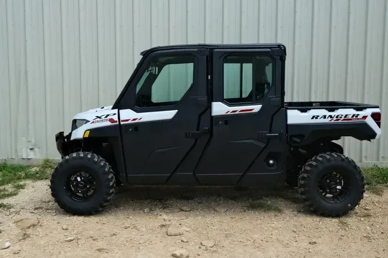 New 2025 Polaris RANGER CREW XP 1000 NORTHSTAR TRAIL BOSS EDITION CRYSTAL WHITE WITH PERFORMANCE RED ACCENTS Image 2