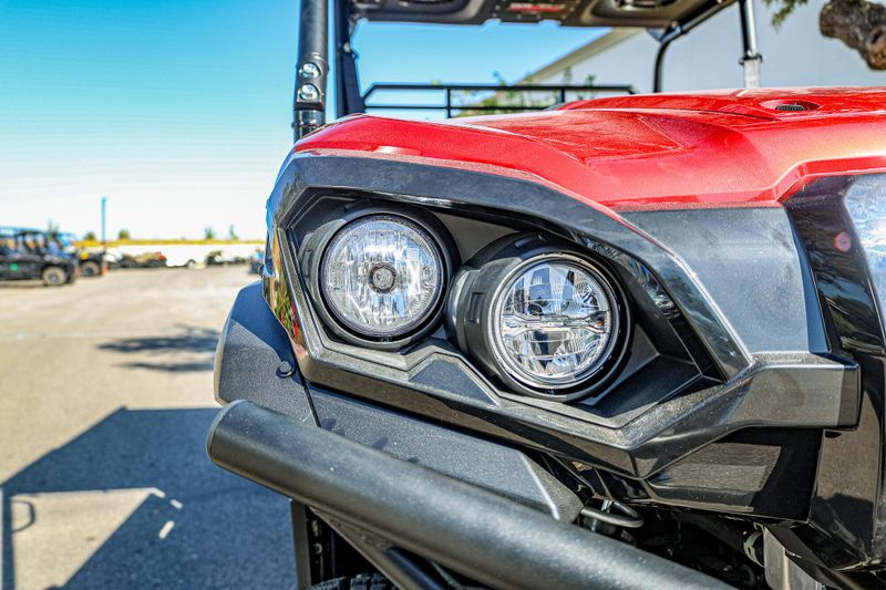 2025 KAWASAKI MULE PROFXT 1000 LE  CANDY PERSIMMON RED in a CANDY PERSIMMON RED exterior color. Family PowerSports (877) 886-1997 familypowersports.com 