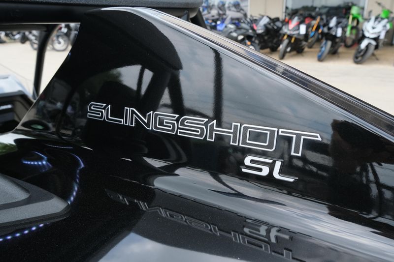 NEW 2025 POLARIS SLINGSHOT SL AUTODRIVE  in a JET BLACK exterior color. Family PowerSports (877) 886-1997 familypowersports.com 
