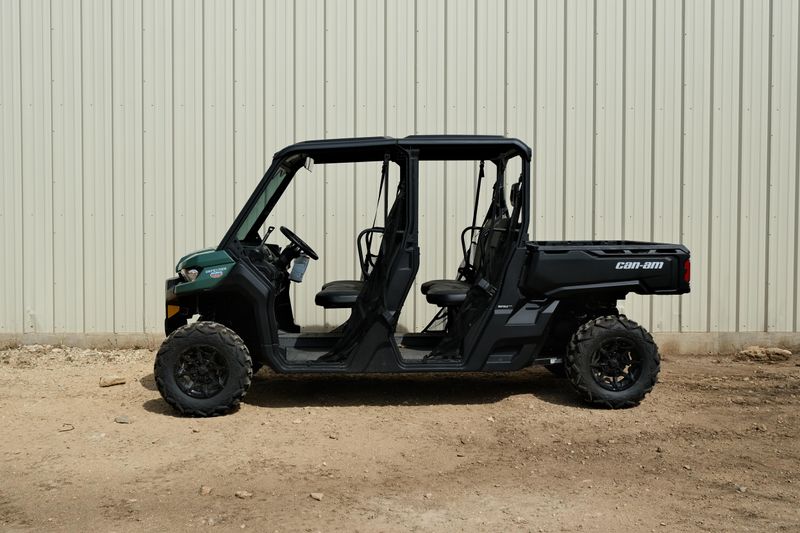 NEW 2026 CAN-AM DEFENDER MAX DPS HD7  in a COMPASS GREEN exterior color. Family PowerSports (877) 886-1997 familypowersports.com 