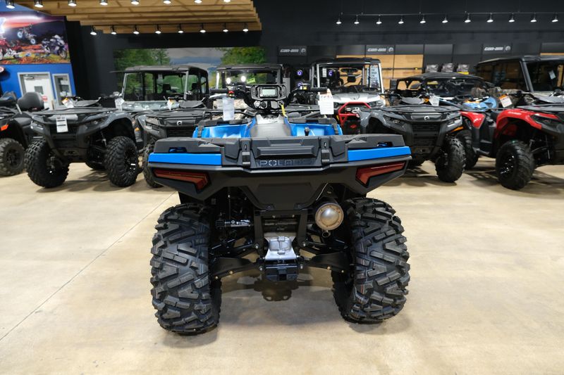 2025 POLARIS SPORTSMAN 570 TRAIL ELECTRIC BLUE in a ELECTRIC BLUE exterior color. Family PowerSports (877) 886-1997 familypowersports.com 