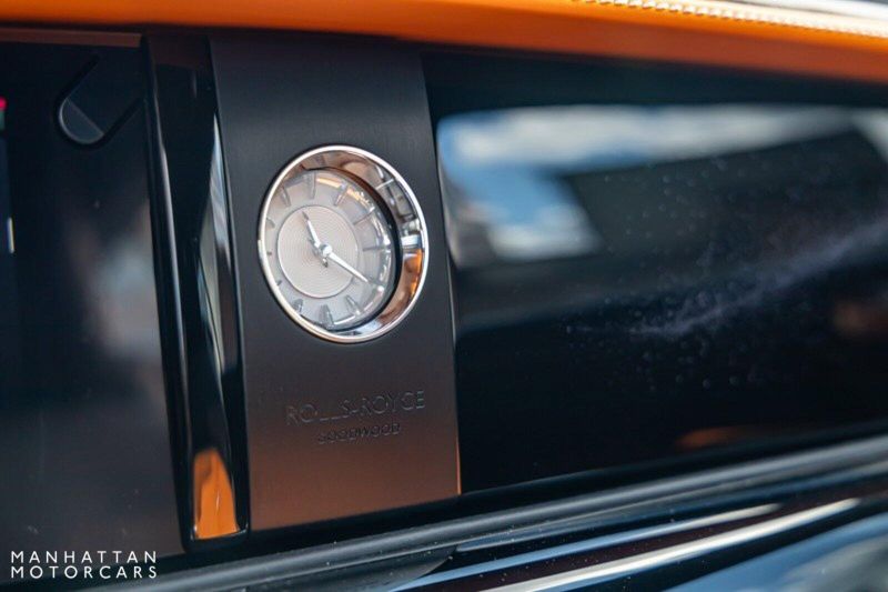 2024 Rolls-Royce Spectre  in a Tempest Grey exterior color and Black with Mandarin Accentsinterior. Lotus Manhattan 347-395-5714 lotusmanhattan.com 