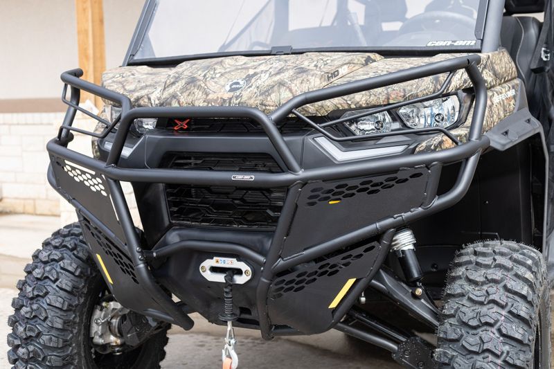 2023 CAN-AM SSV DEF MAX XMR 65 HD10 BC 23 in a CAMO exterior color. Family PowerSports (877) 886-1997 familypowersports.com 