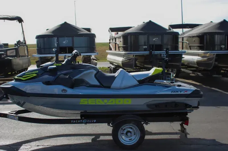 2025 SEADOO RXTX 325 WITH SOUND SYSTEM ICE METAL AND MANTA GREEN Image 1