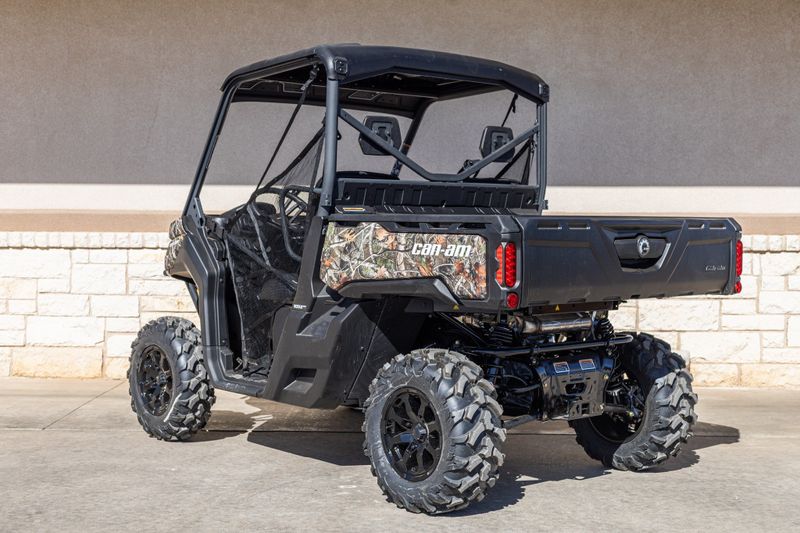 2024 CAN-AM SSV DEF XT 64 HD10 CA 24 in a CAMO exterior color. Family PowerSports (877) 886-1997 familypowersports.com 