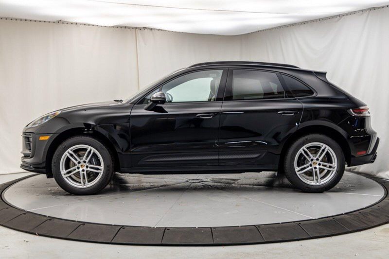 2024 Porsche Macan  in a Black exterior color and Black/Mojave Beigeinterior. Lotus Manhattan 347-395-5714 lotusmanhattan.com 