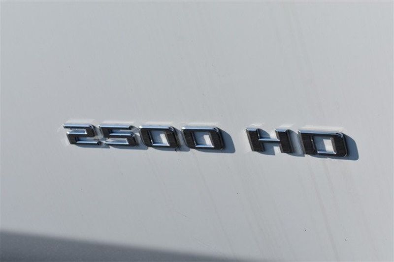 2023 Chevrolet Silverado 2500HD Work Truck in a Summit White exterior color and Blackinterior. Raymond Auto Group 888-703-9950 raymonddeals.com 