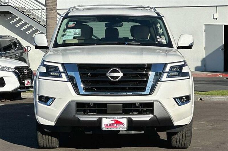 2024 Nissan Armada SL in a Aspen White Tri Coat exterior color and Almondinterior. BEACH BLVD OF CARS beachblvdofcars.com 