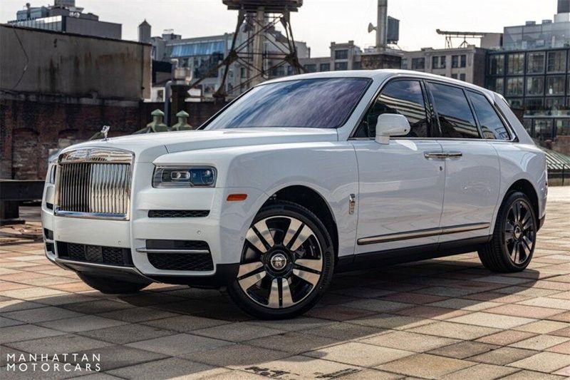 2024 Rolls-Royce Cullinan Silver Badge in a Arctic White exterior color and Black with Charles Blue Accentsinterior. Lotus Manhattan 347-395-5714 lotusmanhattan.com 