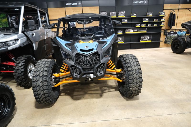 2025 CAN-AM MAVERICK X3 MAX DS TURBO SCANDI BLUE AND ORANGE CRUSH in a SCANDI BLUE AND ORANGE CRUSH exterior color. Family PowerSports (877) 886-1997 familypowersports.com 