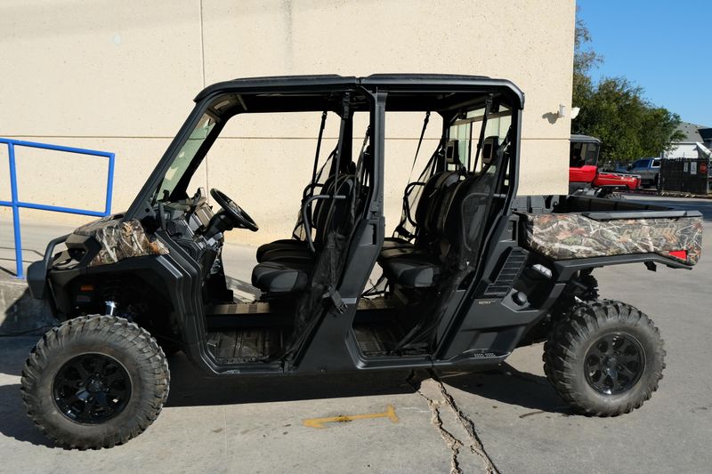 NEW 2026 CAN-AM DEFENDER MAX XT HD11  in a DARK WILDLAND CAMO exterior color. Family PowerSports (877) 886-1997 familypowersports.com 