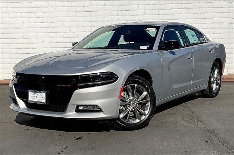 2023 Dodge Charger SXT Awd in a Triple Nickel exterior color and Blackinterior. Crystal Chrysler Jeep Dodge Ram (760) 507-2975 pixelmotiondemo.com 