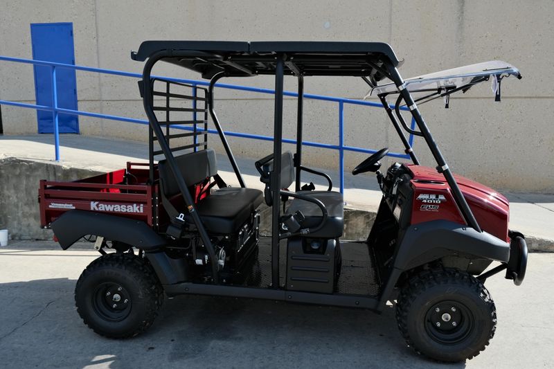 NEW 2026 KAWASAKI MULE 4010 TRANS4X4  in a DARK ROYAL RED exterior color. Family PowerSports (877) 886-1997 familypowersports.com 