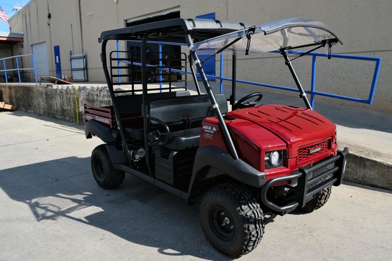 NEW 2026 KAWASAKI MULE 4010 TRANS4X4  in a DARK ROYAL RED exterior color. Family PowerSports (877) 886-1997 familypowersports.com 