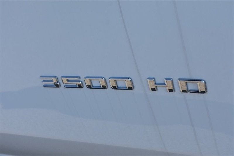 2024 Chevrolet Silverado 3500HD LT in a Summit White exterior color and Blackinterior. Raymond Auto Group 888-703-9950 raymonddeals.com 