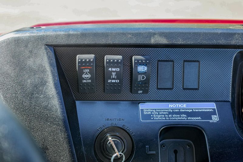 2025 KAWASAKI MULE PROFXT 1000 LE  CANDY PERSIMMON RED in a CANDY PERSIMMON RED exterior color. Family PowerSports (877) 886-1997 familypowersports.com 