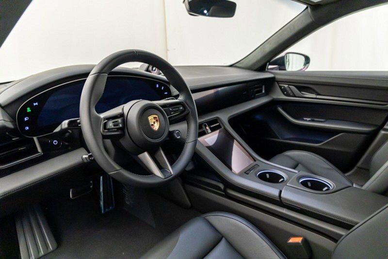 2024 Porsche Taycan GTS in a Jet Black Metallic exterior color and Blackinterior. Lotus Manhattan 347-395-5714 lotusmanhattan.com 