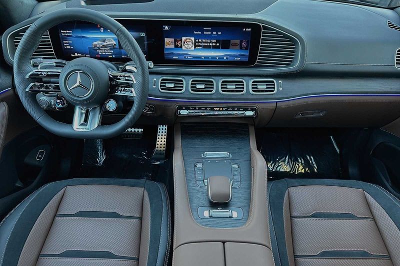 2024 Mercedes-Benz GLE-Class GLEGLE 63 S AMG in a TWILIGHT BLUE exterior color and AMG BAHIA BROWNinterior. SHELLY AUTOMOTIVE shellyautomotive.com 