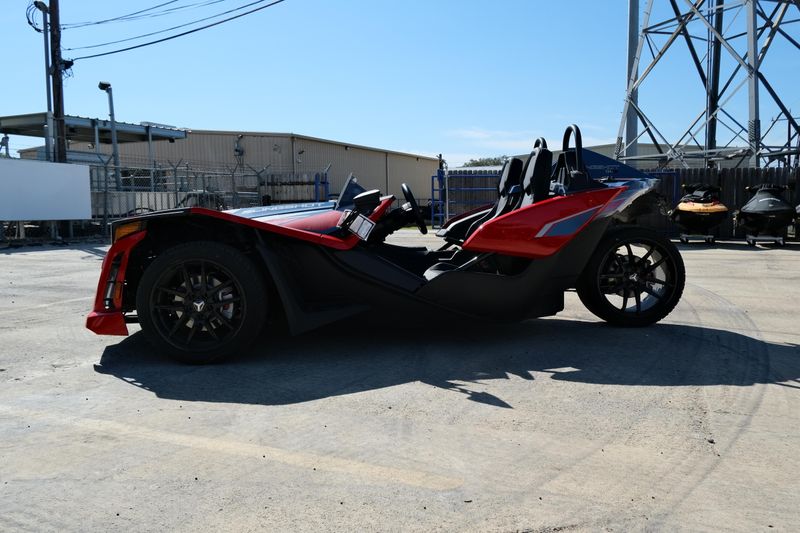 NEW 2025 POLARIS SLINGSHOT SLR AUTODRIVE  in a ROYAL RED exterior color. Family PowerSports (877) 886-1997 familypowersports.com 