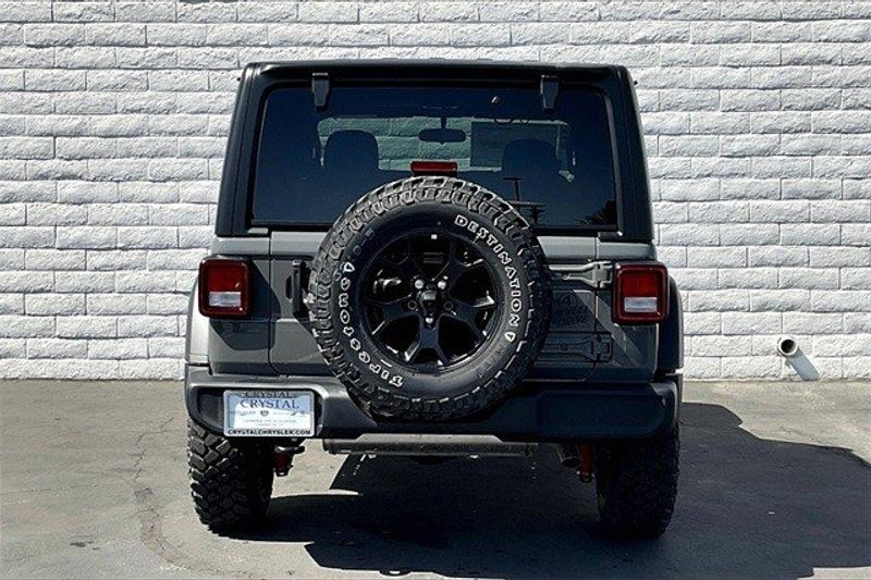 2023 Jeep Wrangler 2-door Willys 4x4 in a Sting-Gray Clear Coat exterior color and Blackinterior. Crystal Chrysler Jeep Dodge Ram (760) 507-2975 pixelmotiondemo.com 