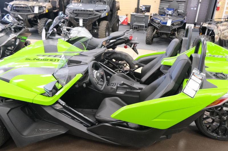 NEW 2025 POLARIS SLINGSHOT SL MANUAL  in a LIQUID LIME exterior color. Family PowerSports (877) 886-1997 familypowersports.com 