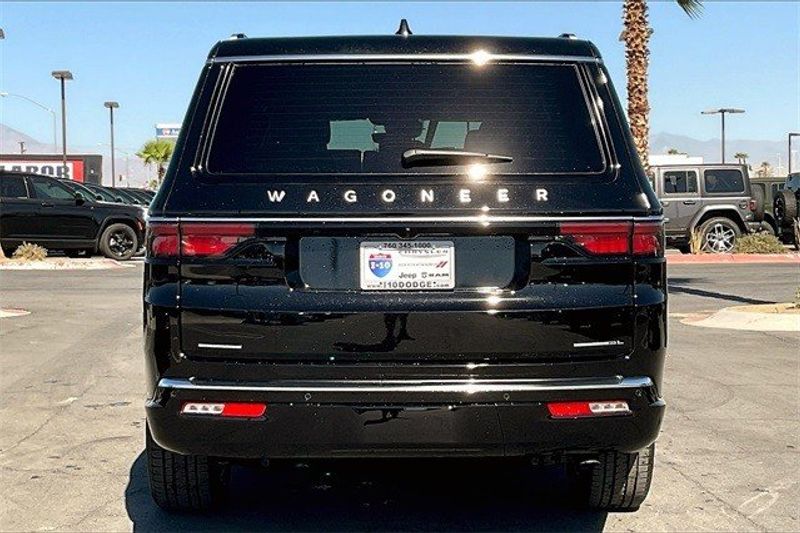 2023 Wagoneer L Series III 4X4 in a Diamond Black Crystal Pearl Coat exterior color and Global Blk Lth Trm Bkt Stinterior. I-10 Chrysler Dodge Jeep Ram (760) 565-5160 pixelmotiondemo.com 