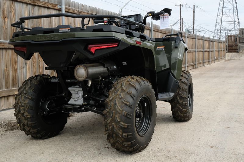 2025 POLARIS SPORTSMAN 450 HO EPS SAGE GREEN in a SAGE GREEN exterior color. Family PowerSports (877) 886-1997 familypowersports.com 