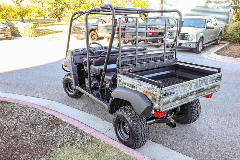 NEW 2026 KAWASAKI MULE 4010 TRANS4X4  in a TRUETIMBER STRATA exterior color. Family PowerSports (877) 886-1997 familypowersports.com 