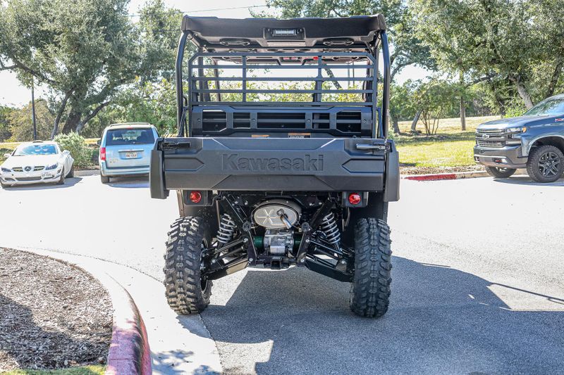 2025 KAWASAKI MULE PROFXT 1000 LE  CANDY PERSIMMON RED in a CANDY PERSIMMON RED exterior color. Family PowerSports (877) 886-1997 familypowersports.com 