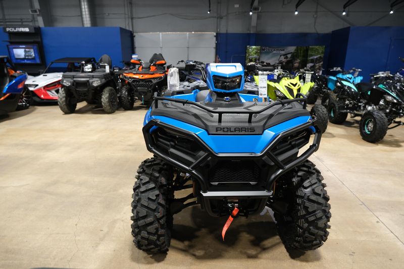 2025 POLARIS SPORTSMAN 570 TRAIL ELECTRIC BLUE in a ELECTRIC BLUE exterior color. Family PowerSports (877) 886-1997 familypowersports.com 