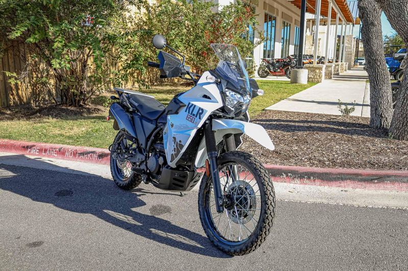 2025 KAWASAKI KLR 650 S  PEARL CRYSTAL WHITEMETALLIC CARBON GRAY in a PEARL CRYSTAL WHITE/METALLIC CARBON GRAY exterior color. Family PowerSports (877) 886-1997 familypowersports.com 