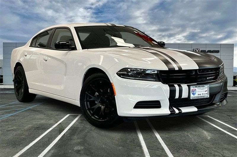 2023 Dodge Charger SXT Rwd in a White Knuckle exterior color and Blackinterior. I-10 Chrysler Dodge Jeep Ram (760) 565-5160 pixelmotiondemo.com 
