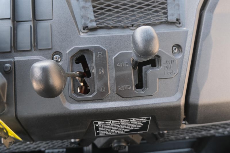 NEW 2026 HONDA PIONEER 7004  in a HERO RED exterior color. Family PowerSports (877) 886-1997 familypowersports.com