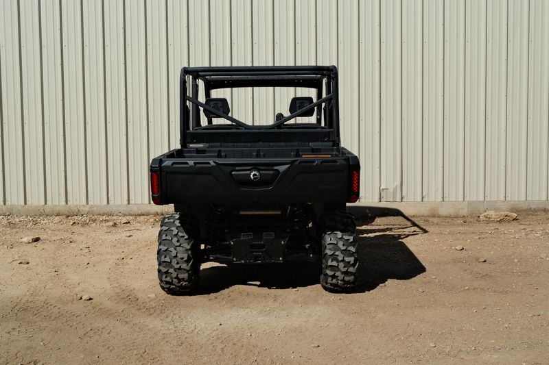 NEW 2026 CAN-AM DEFENDER MAX DPS HD9  in a STEALTH BLACK exterior color. Family PowerSports (877) 886-1997 familypowersports.com 