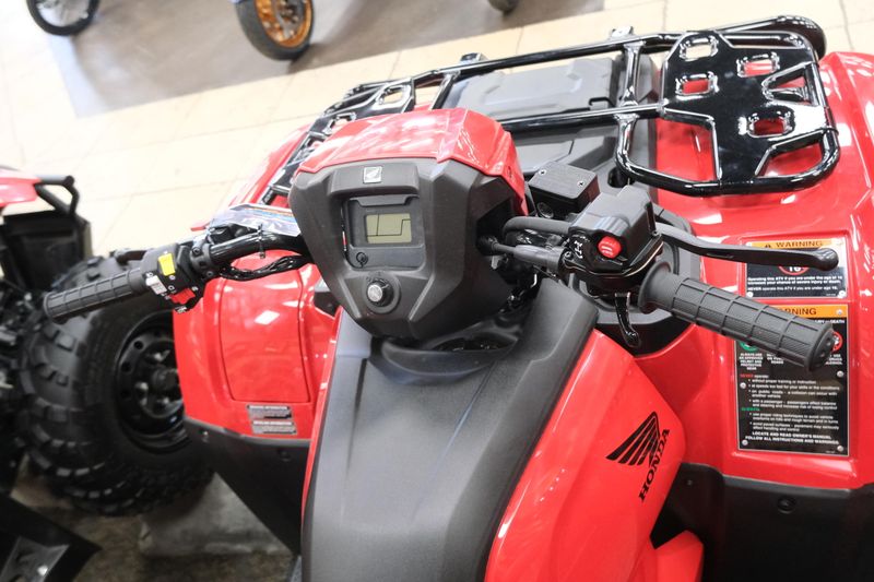NEW 2026 HONDA FOREMAN 4X4 EPS  in a HERO RED exterior color. Family PowerSports (877) 886-1997 familypowersports.com 