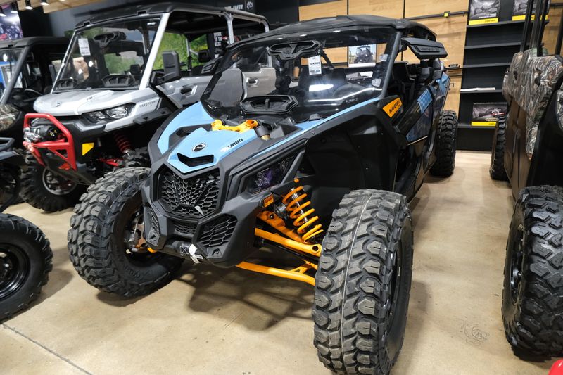 2025 CAN-AM MAVERICK X3 MAX DS TURBO SCANDI BLUE AND ORANGE CRUSH in a SCANDI BLUE AND ORANGE CRUSH exterior color. Family PowerSports (877) 886-1997 familypowersports.com 