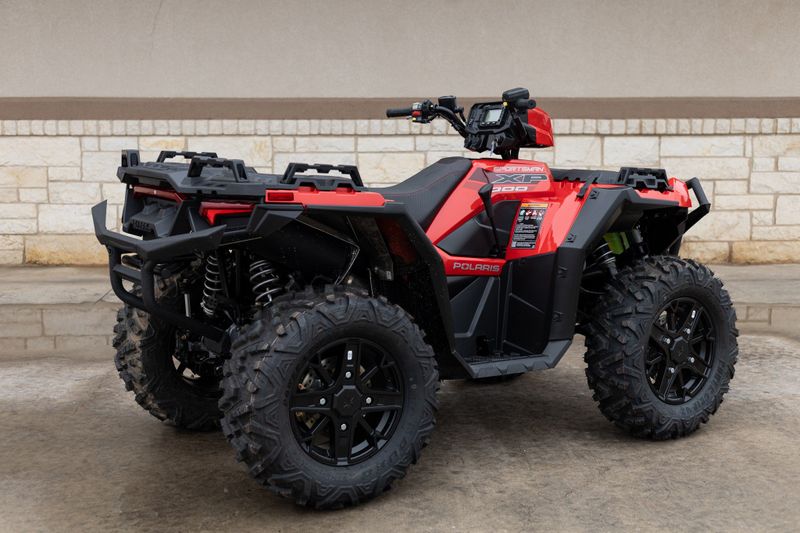 2024 POLARIS SPORTSMAN XP 1000 ULTIMATE TRAIL  INDY RED in a RED exterior color. Family PowerSports (877) 886-1997 familypowersports.com 