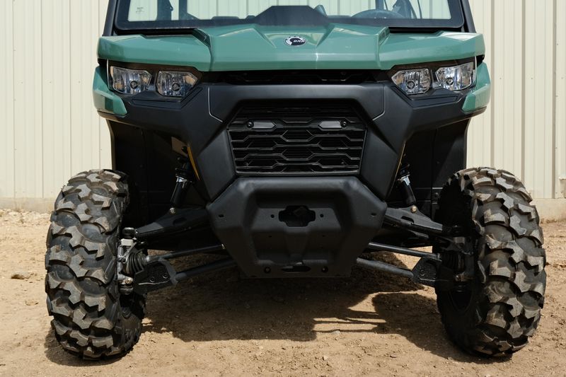 NEW 2026 CAN-AM DEFENDER MAX DPS HD7  in a COMPASS GREEN exterior color. Family PowerSports (877) 886-1997 familypowersports.com 