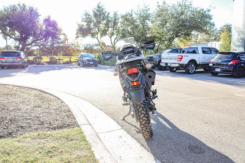 2025 KAWASAKI KLR 650 S  PEARL CRYSTAL WHITEMETALLIC CARBON GRAY in a PEARL CRYSTAL WHITE/METALLIC CARBON GRAY exterior color. Family PowerSports (877) 886-1997 familypowersports.com 