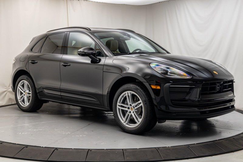 2024 Porsche Macan  in a Black exterior color and Black/Mojave Beigeinterior. Lotus Manhattan 347-395-5714 lotusmanhattan.com 