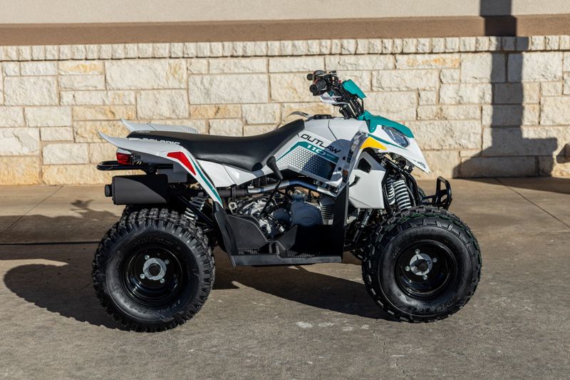2024 POLARIS ATV24OTLW 110WHTRAD GRN in a WHITE/ GREEN exterior color. Family PowerSports (877) 886-1997 familypowersports.com 